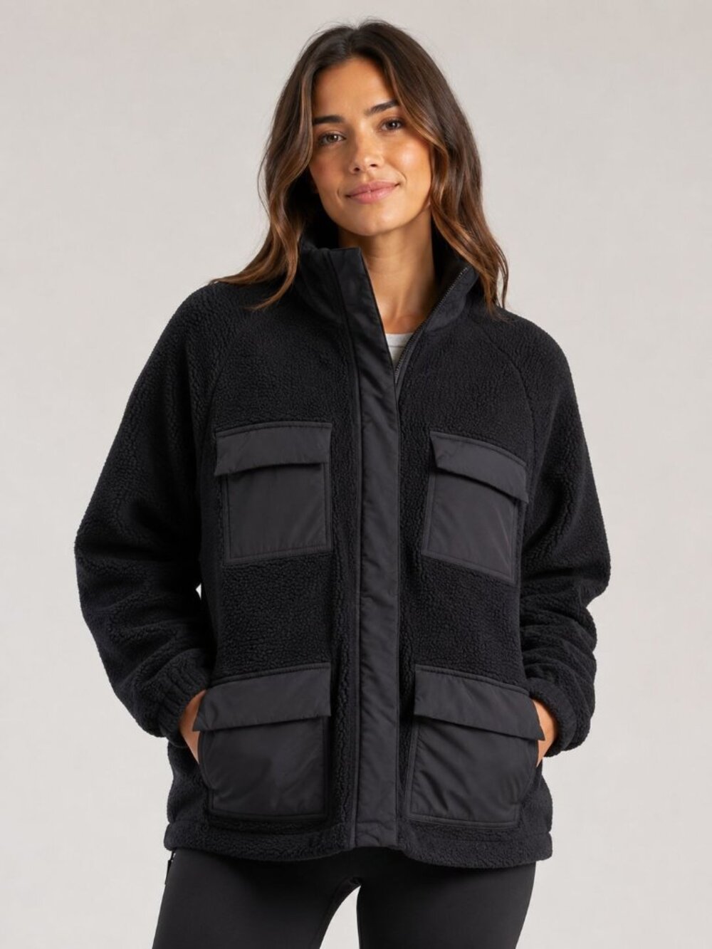Vuori Women's Utility Sherpa Jacket in black, textured fleece and four pockets